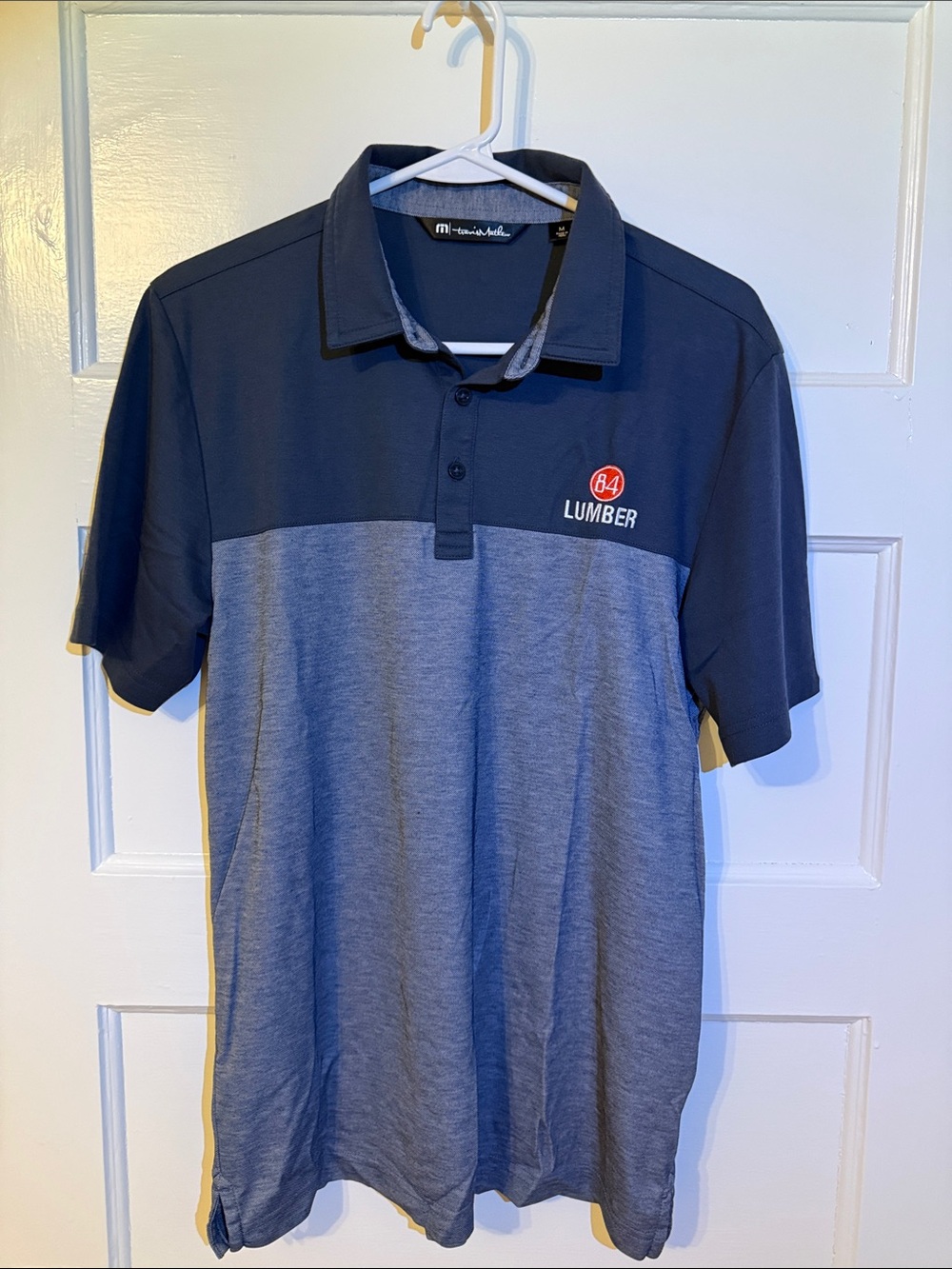 Travis Mathew Two-Tone Navy and Heather Polo with Embroidered Logo